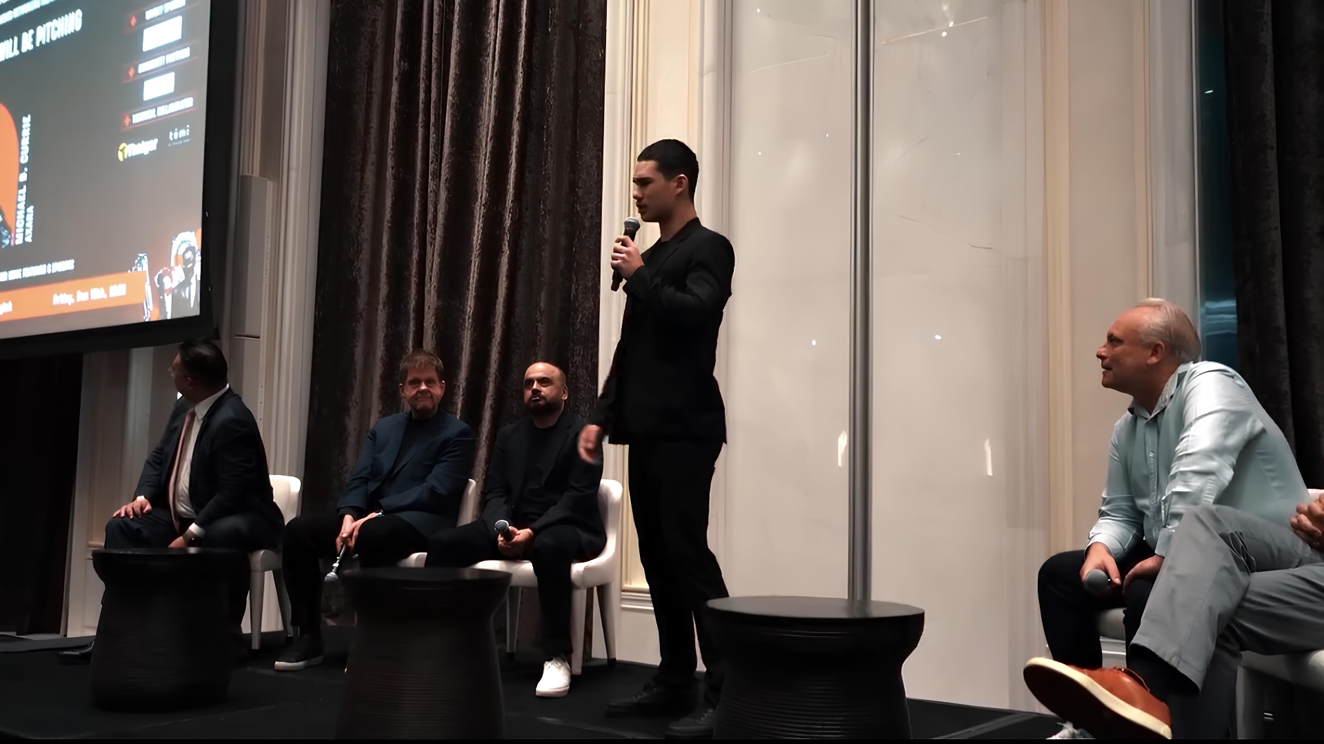 Michael Brown pitching on stage